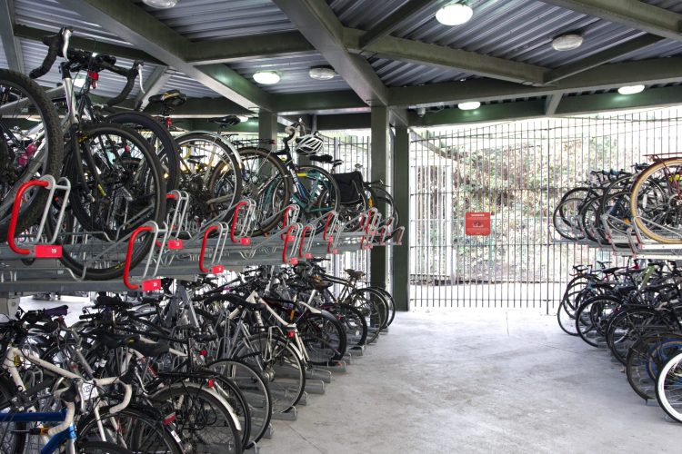The Optima Two Tier Rack under a covered area providing high capacity bicycle parking.