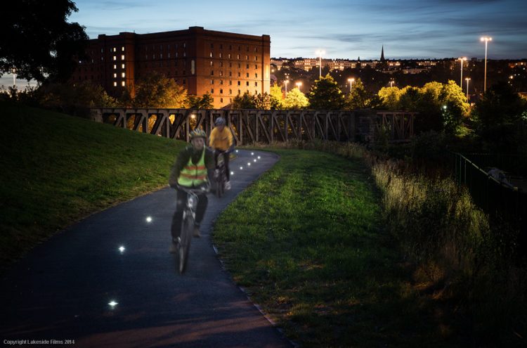 Example of two cyclists using cycle pathway with Solareye installed to light up the route
