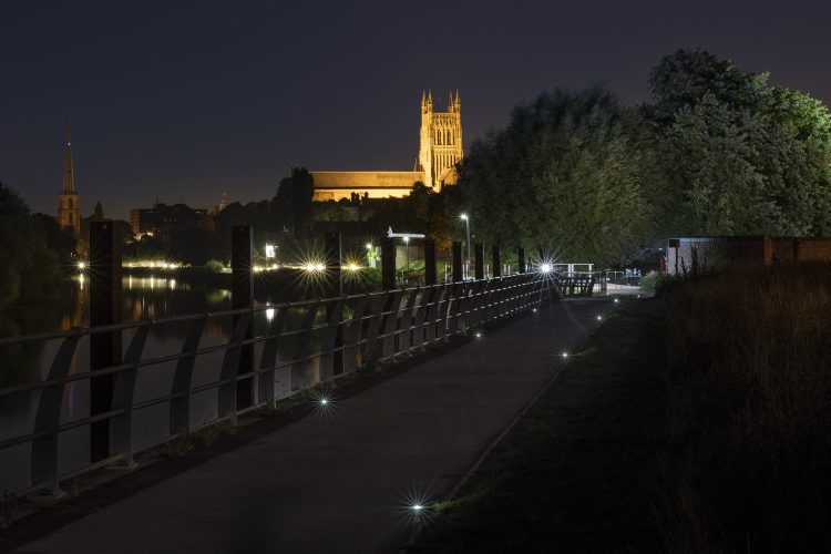 An example of the Solareye solar-powered LED lighting in the evening, illuminating a cycleway